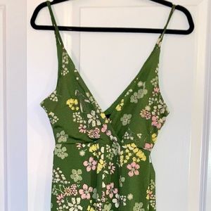 Long spaghetti strap jumpsuit. Green with pink and white flowers, size medium.